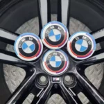 "50th" stiliaus ratlankių dangteliai 56mm skirti BMW - Image 2