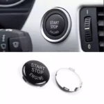 Juodas blizgus start-stop mygtuko dangtelis skirtas BMW E serijos modeliams