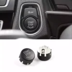 Juodas, matinis start-stop mygtuko dangtelis skirtas BMW F serijos modeliams