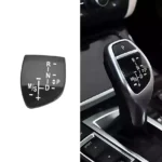 Pavarų svirties emblema skirta BMW F serijos modeliams