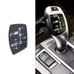 Pavarų svirties emblema skirta BMW F serijos modeliams
