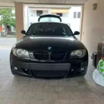 Juodos, blizgios, dvigubos grotelės skirtos BMW E81, E82, E87, E88 (2004-2007) - Image 5