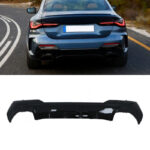Juodas, blizgus, galinio buferio difuzorius skirtas BMW G22