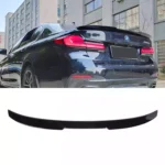 Juodas, blizgus "CS" stiliaus spoileris skirtas BMW G30
