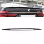 Juodas, blizgus spoileris skirtas BMW G11, G12