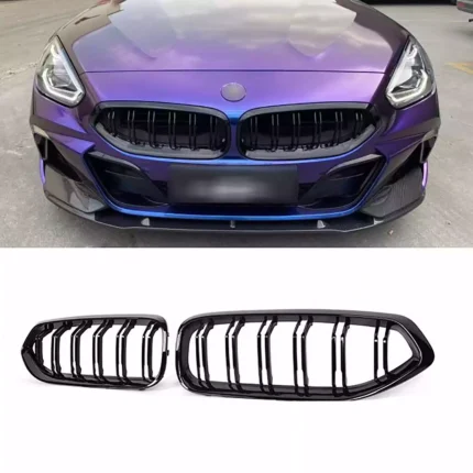 Juodos, blizgios, dvigubos grotelės skirtos BMW G29